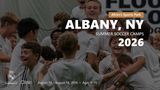 Kids in Real Madrid camp uniforms celebrating together in a joyful group during the Albany, NY 2026 summer camp.