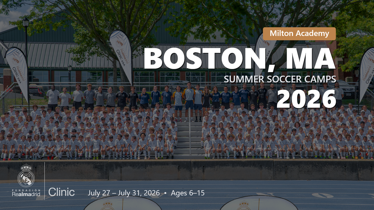 Large group of kids and trainers in Real Madrid uniforms posing for a 2026 summer soccer camp photo in Boston, MA at Milton Academy.