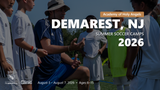 Coach giving instructions to young players in Real Madrid camp uniforms during the Demarest, NJ 2026 summer camp.