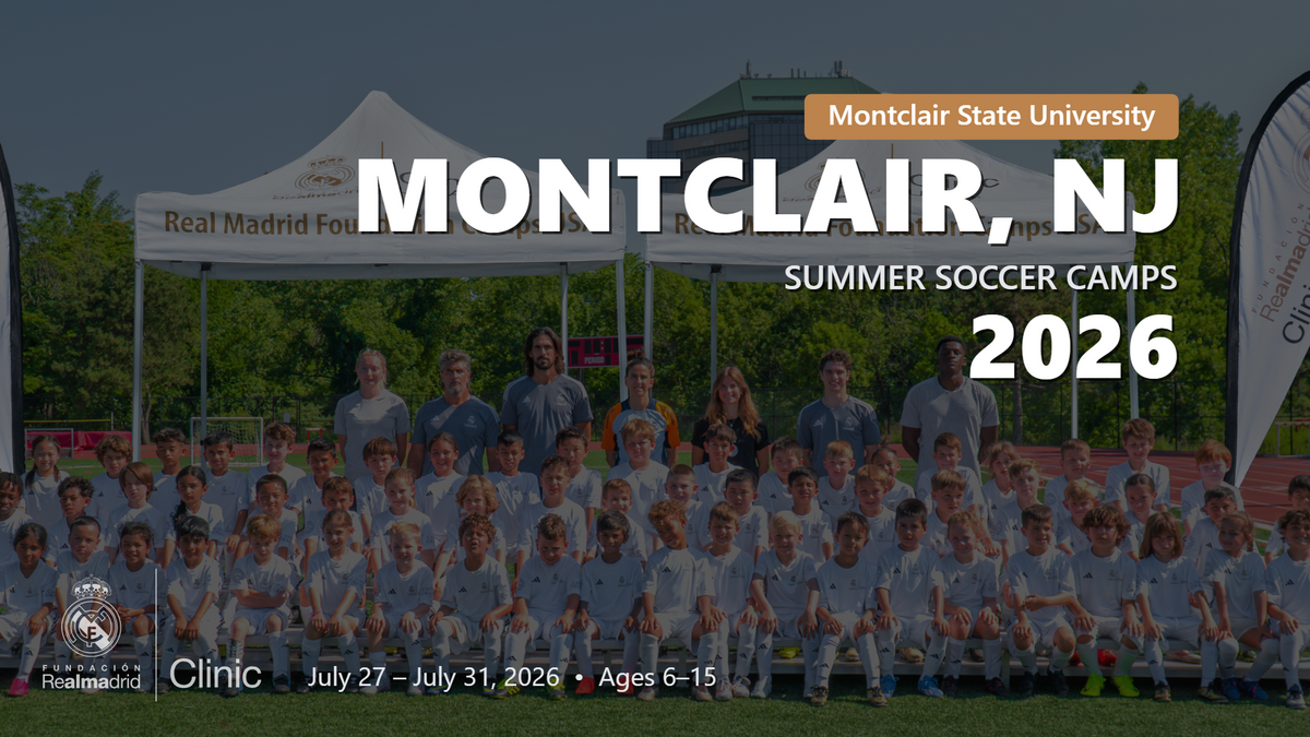 Large group of young players and coaches in Real Madrid camp uniforms posing for a team photo at the Montclair, NJ 2026 summer soccer camp.