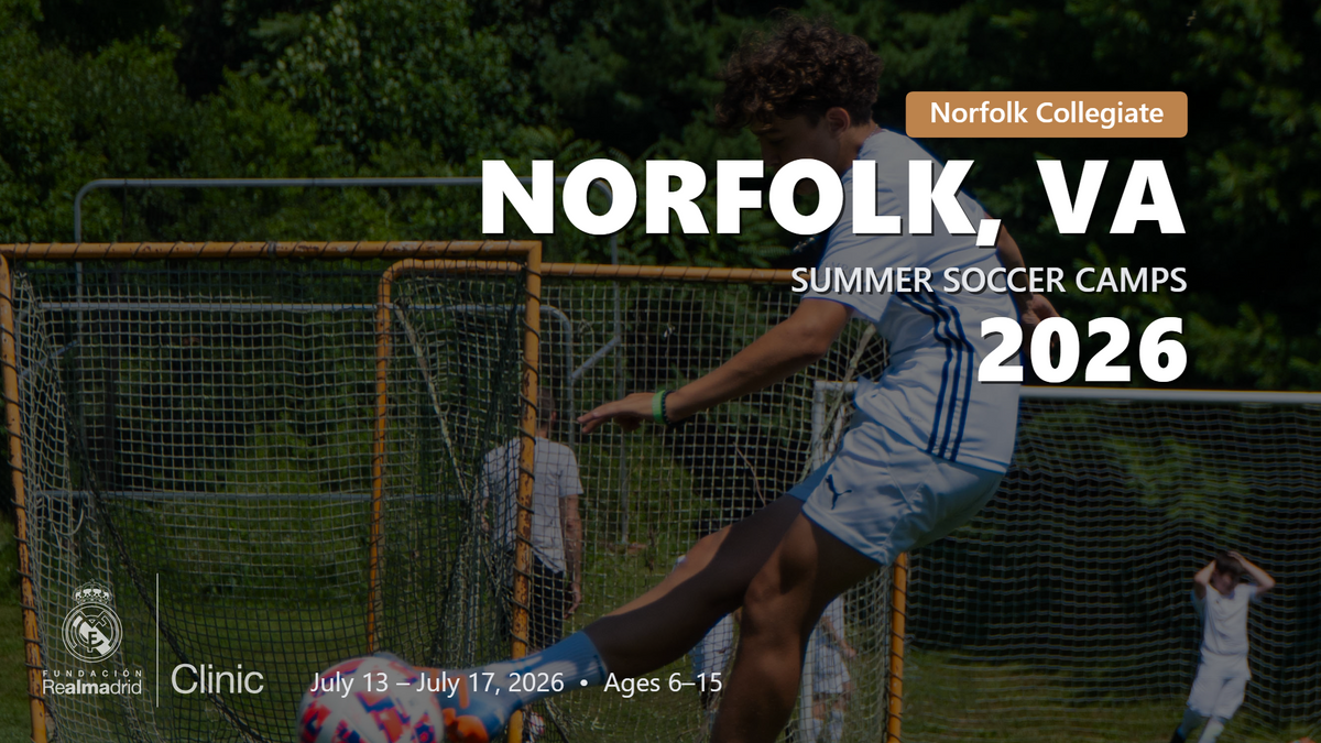 Player in a Real Madrid camp uniform striking a ball mid-air during the Norfolk, VA 2026 summer soccer camp.
