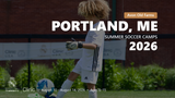 Young goalkeeper in Real Madrid camp uniform practicing with a ball during the Portland, ME 2026 summer soccer camp.